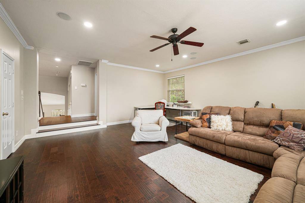 Ample natural light fills the room from two large windows. And stay organized with the game room closet!
