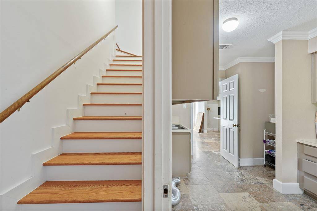 A private stairway leads to the fourth bedroom. Ideal for guest suite with added privacy."