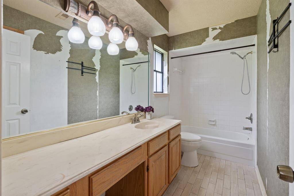 Secondary bathroom offers great potential and is ready for your personal touch and updates.