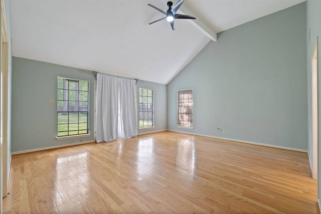 Grand size primary room with natural lighting.