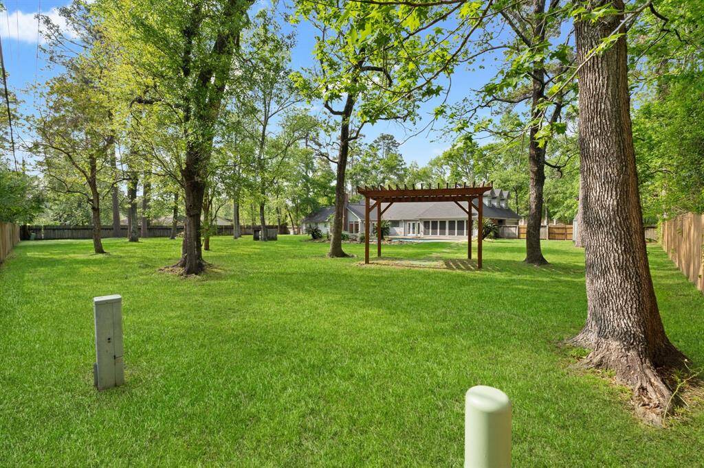 Enjoy this generous-sized yard with plenty of space to relax, play, and entertain