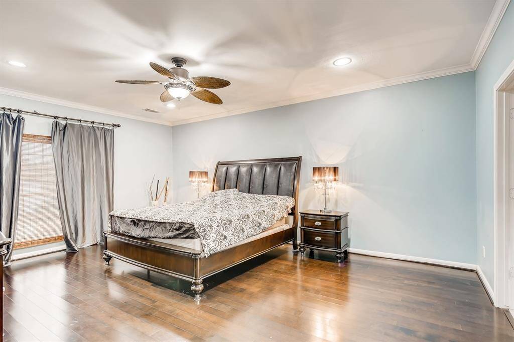 Primary bedroom on 2nd floor with wood floors
