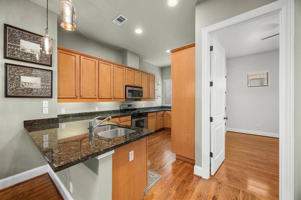 Kitchen next too 2nd bedroom