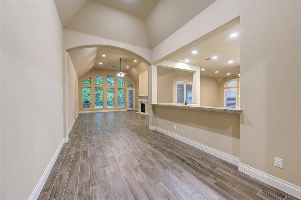 Amazing hallway leading into that incredible kitchen and cozy living room!