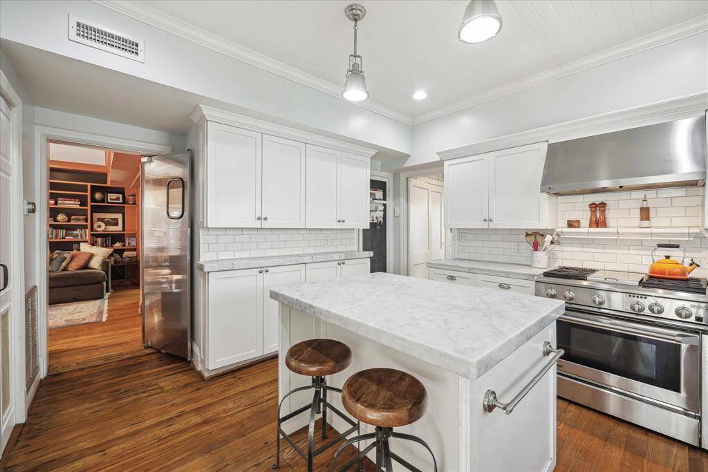 Another angle of Kitchen that shows access to Family Room.