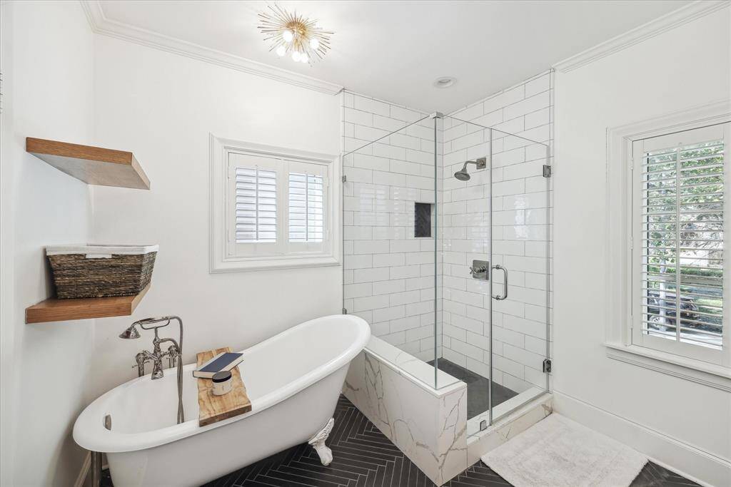 View of walk-in shower and soaking tub in Primary Bathroom.