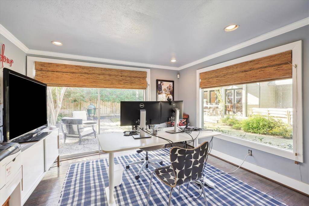 Detached quarters currently used as a home office. There is a full bathroom in this space as well.