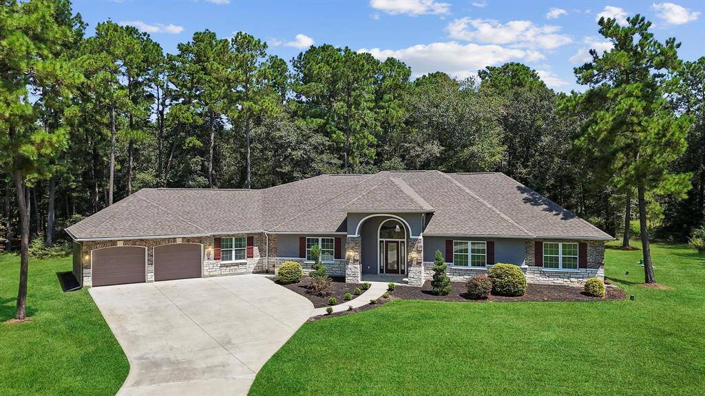 Welcome home to 17501 Julianne Dr. Beautiful exterior featuring 2 car garage, double wide driveway, and impeccable landscaping.