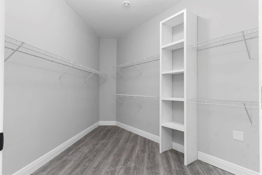 Large walk in closet for all your storage needs.