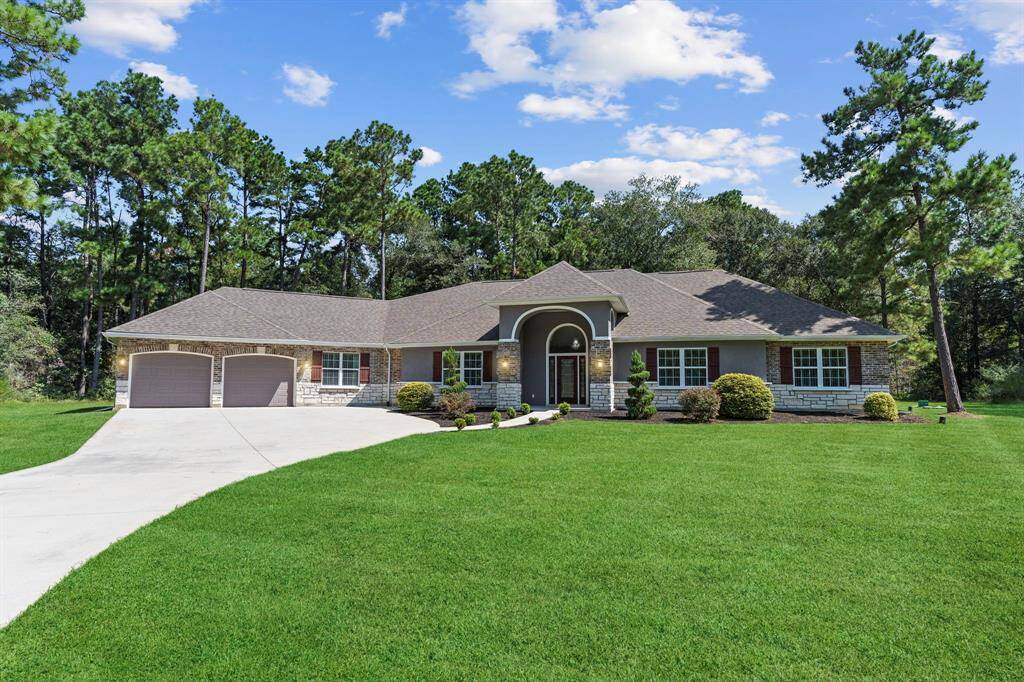 Welcome home to 17501 Julianne Dr. Beautiful exterior featuring 2 car garage, double wide driveway, and impeccable landscaping.
