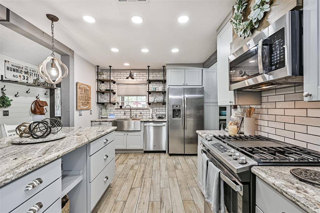 Recessed lighting throughout the home provides a clean, modern look while illuminating each space with soft lighting for a bright and welcoming atmosphere.