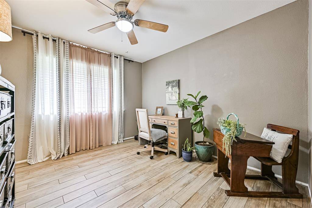 Bedroom 3 features a spacious closet with custom shelving for organized storage.