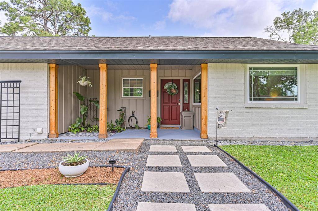 Cedar-wrapped posts add a warm, modern touch to the front porch—instantly boosting curb appeal and welcoming guests with timeless charm.