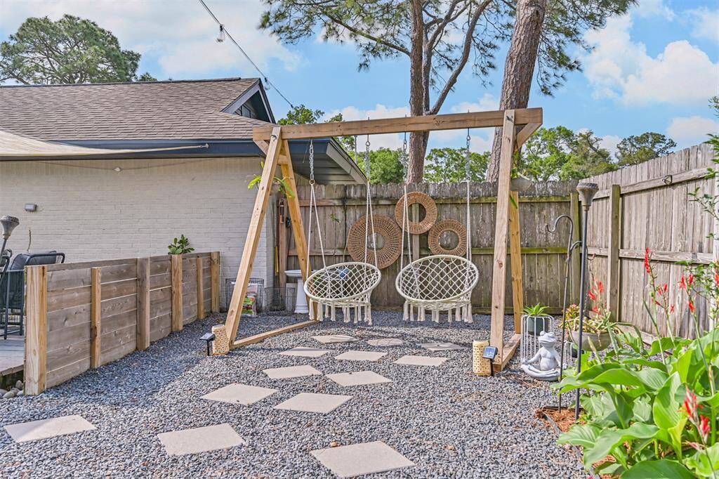 Privacy walls thoughtfully placed in the backyard create distinct outdoor spaces—perfect for relaxing, entertaining, or enjoying quiet moments in your own private retreat.
