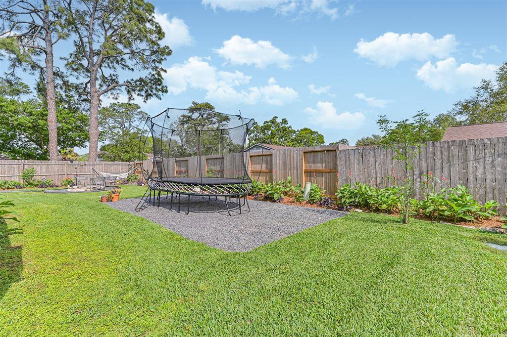 The backyard is fully equipped with a partially new back fence (installed July 2024), horizontal privacy fences (installed 2023), and a dog run with a side gate (2023)—ensuring both privacy and functionality for your outdoor space.