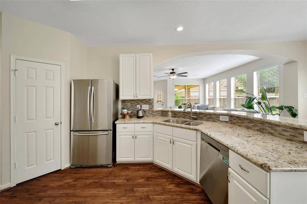 A walk-in pantry provides great storage.