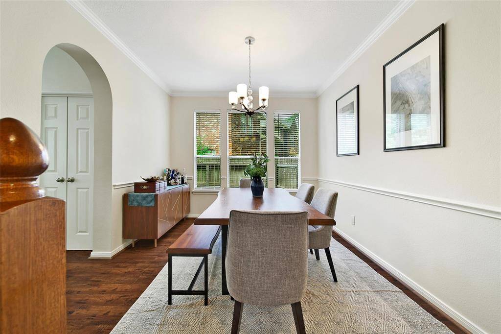 The formal dining room is ready for hosting family and friends.