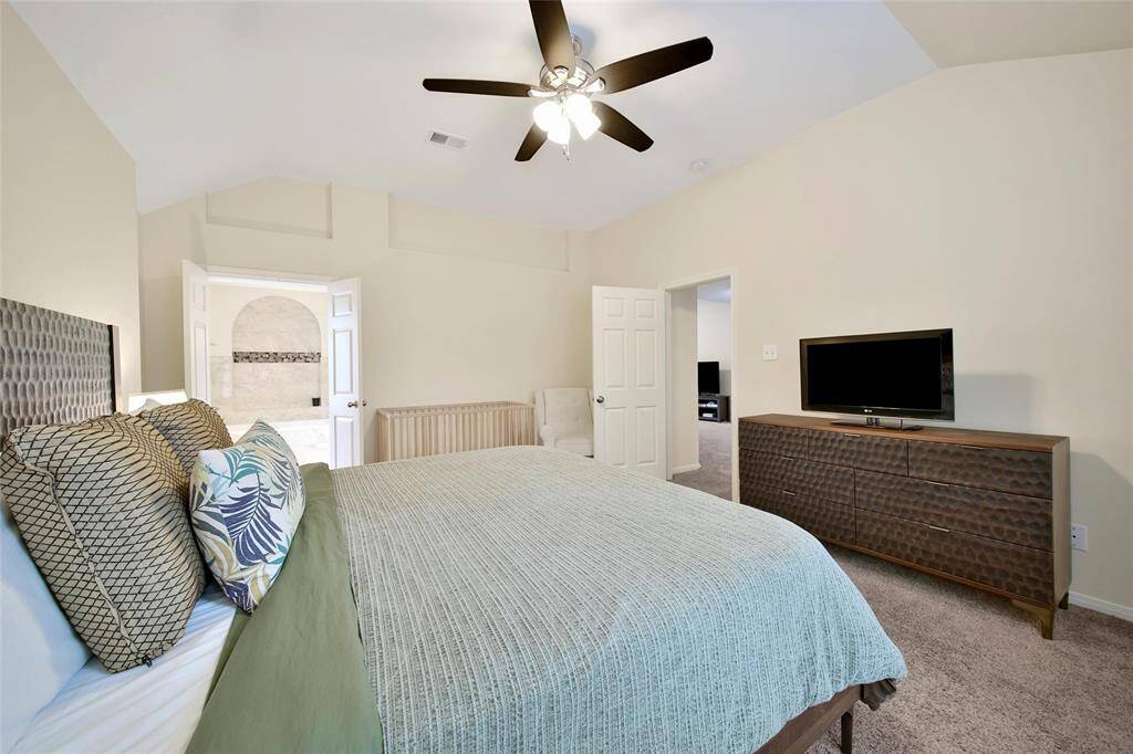 A large bedroom offers easy furniture arrangement.