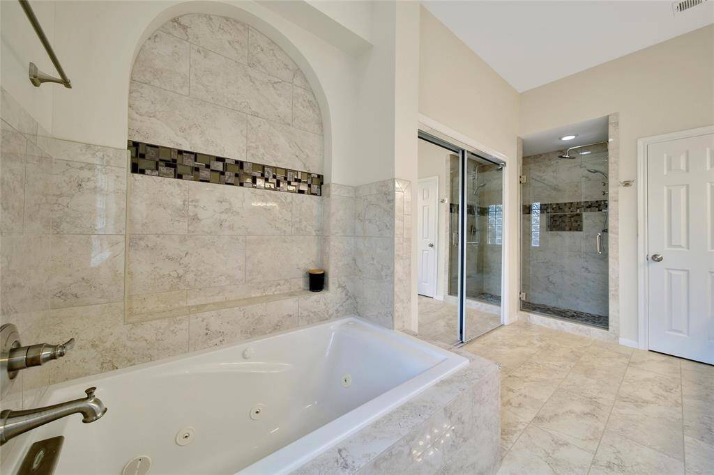 The jetted tub is a perfect way to relax. Or you'll love the oversized shower.