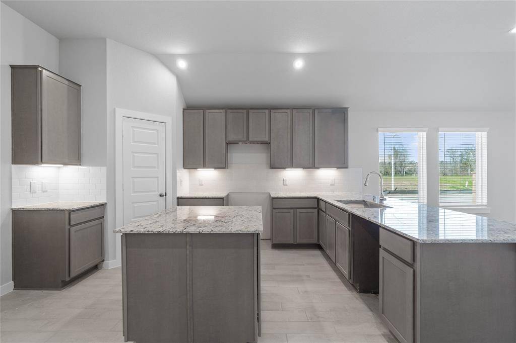 This photo is for illustrative purposes only and is not to be considered an exact replica of the finished home. Rendering does not match the finished product in terms of features, colors, landscaping, etc. Pricing, specifications, square footage and materials are subject to change at any time and without notice.
