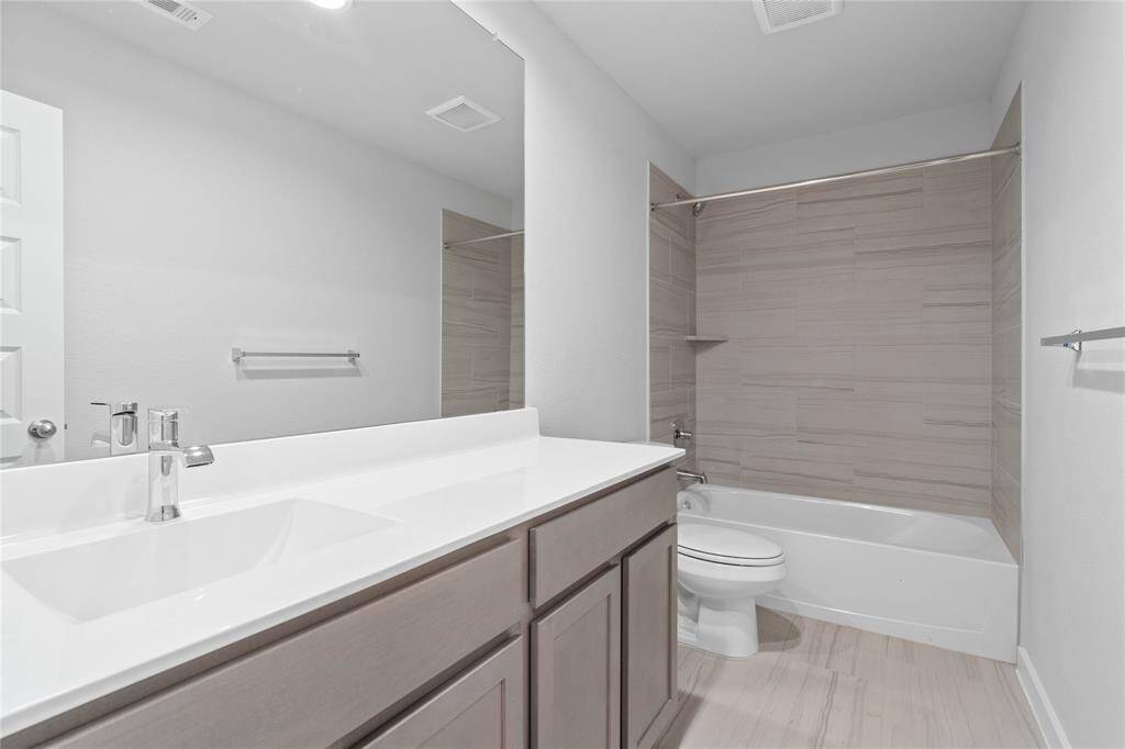 This photo is for illustrative purposes only and is not to be considered an exact replica of the finished home. Rendering does not match the finished product in terms of features, colors, landscaping, etc. Pricing, specifications, square footage and materials are subject to change at any time and without notice.