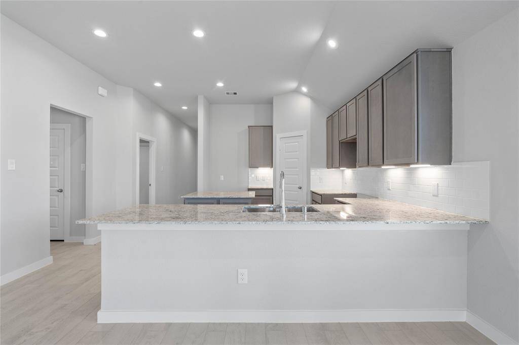 This photo is for illustrative purposes only and is not to be considered an exact replica of the finished home. Rendering does not match the finished product in terms of features, colors, landscaping, etc. Pricing, specifications, square footage and materials are subject to change at any time and without notice.