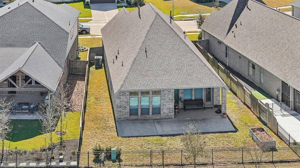 Aerial view of the spacious porch and large yard provideplenty of options for outdoor activities.