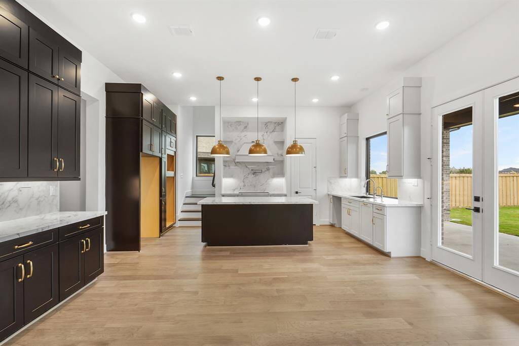 REPRESENTATIVE PHOTO: Colors and options vary. Confirm options and selections with onsite Community Sales Manager.