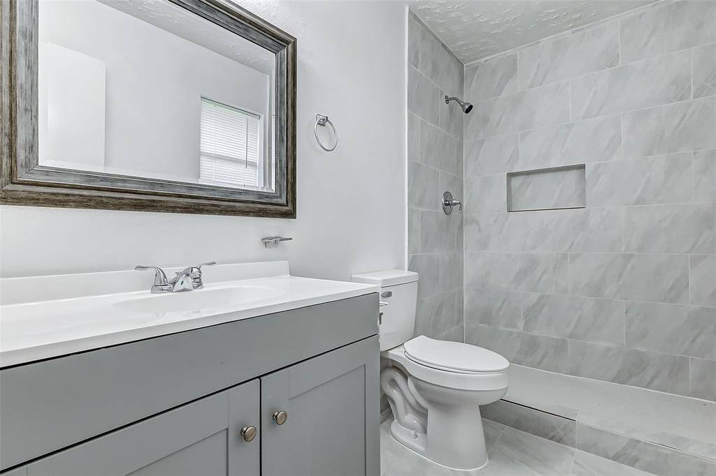 Privacy and convenience are ensured with the inclusion of a second full-size bathroom.