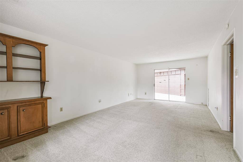 Large primary bedroom downstairs with space for a study or additional sitting room
