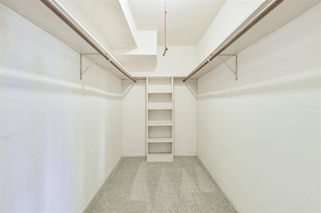 Primary bedroom's  walk-in closet space.
