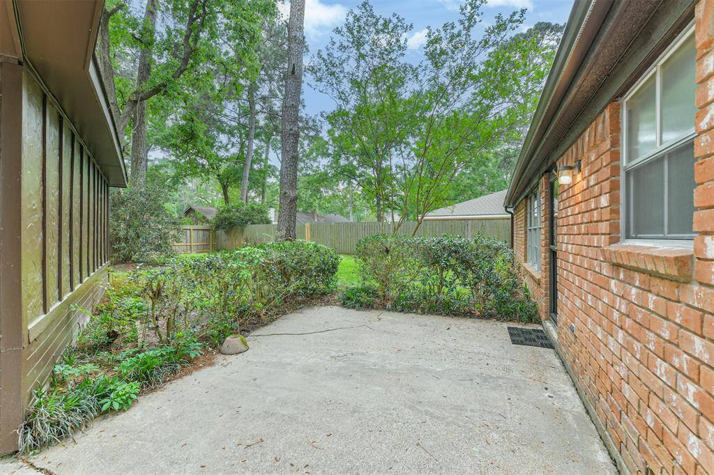 Back patio between garage and house