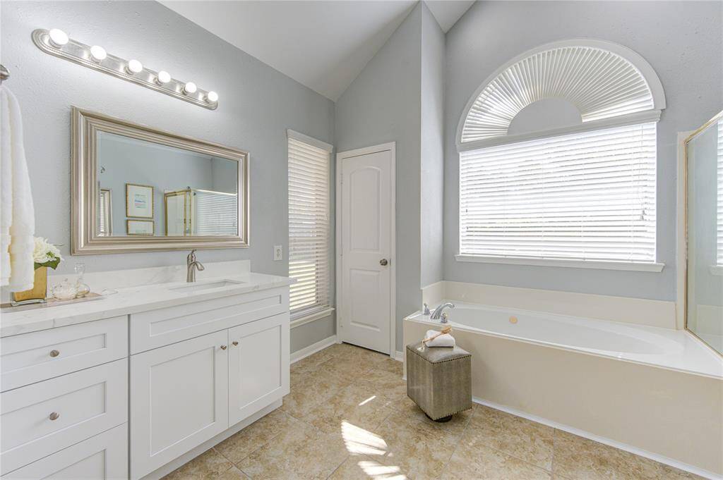 New vanities in all bathrooms include all new cabinets with quartz counters, new sinks, faucets and mirrors.