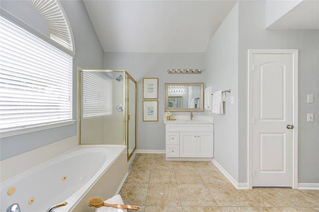Start your mornings with the walk-in shower, then end your days on a luxurious note with a long soak in the jetted soaker tub.