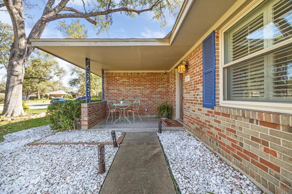 The inviting front porch is perfect for morning coffee.