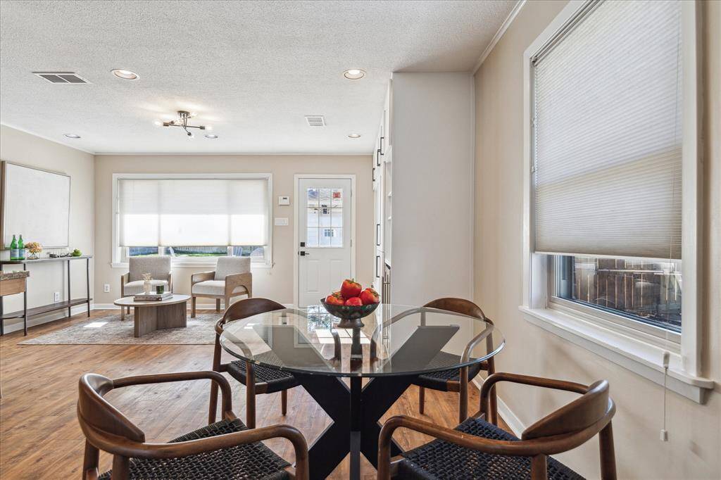 The dining area has plenty of light and is right off of the kitchen for easy serving access.