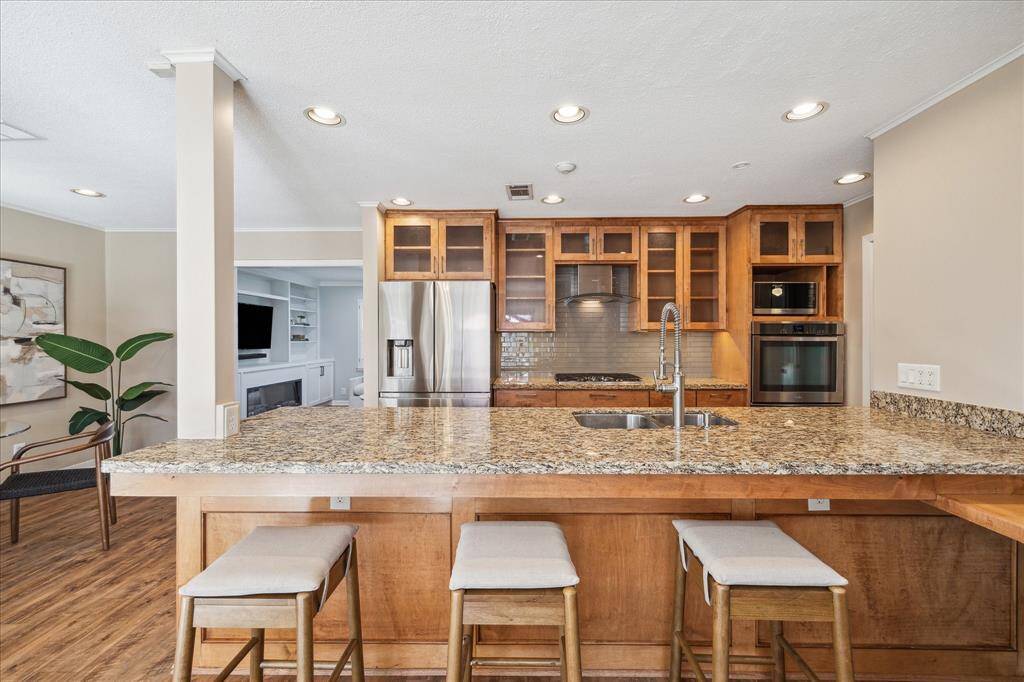 The kitchen is complete with a breakfast bar area making for easy mornings and easy cleanup after snacks or meals.