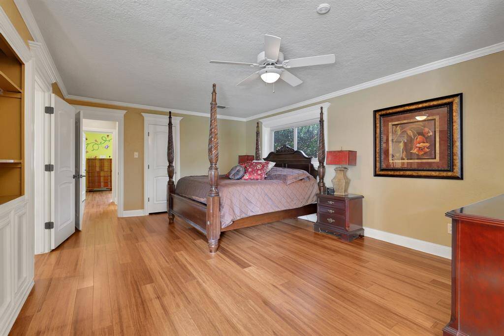 Primary bath has separate sinks and beautiful walk in shower.