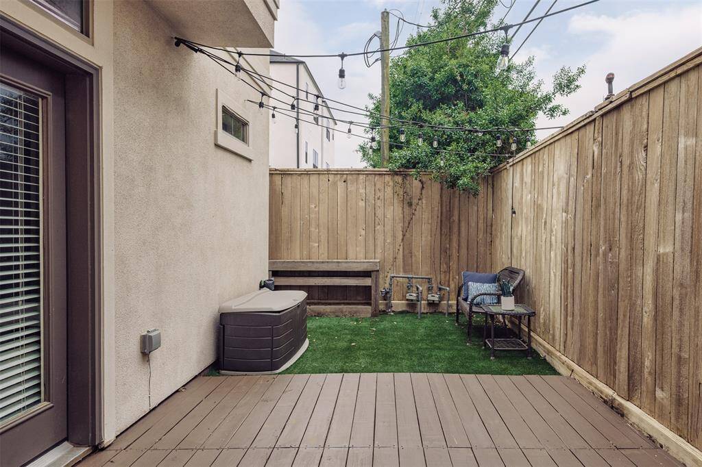 turfed backyard and recent decking.