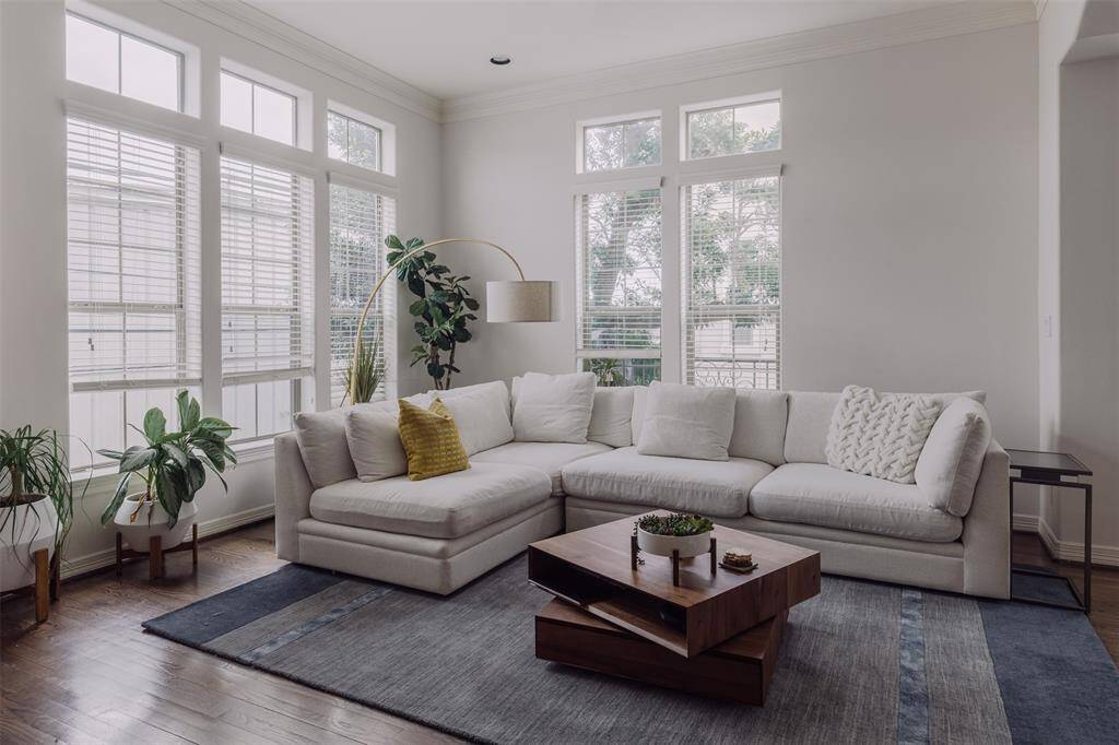 living area with plenty of natural light and windows