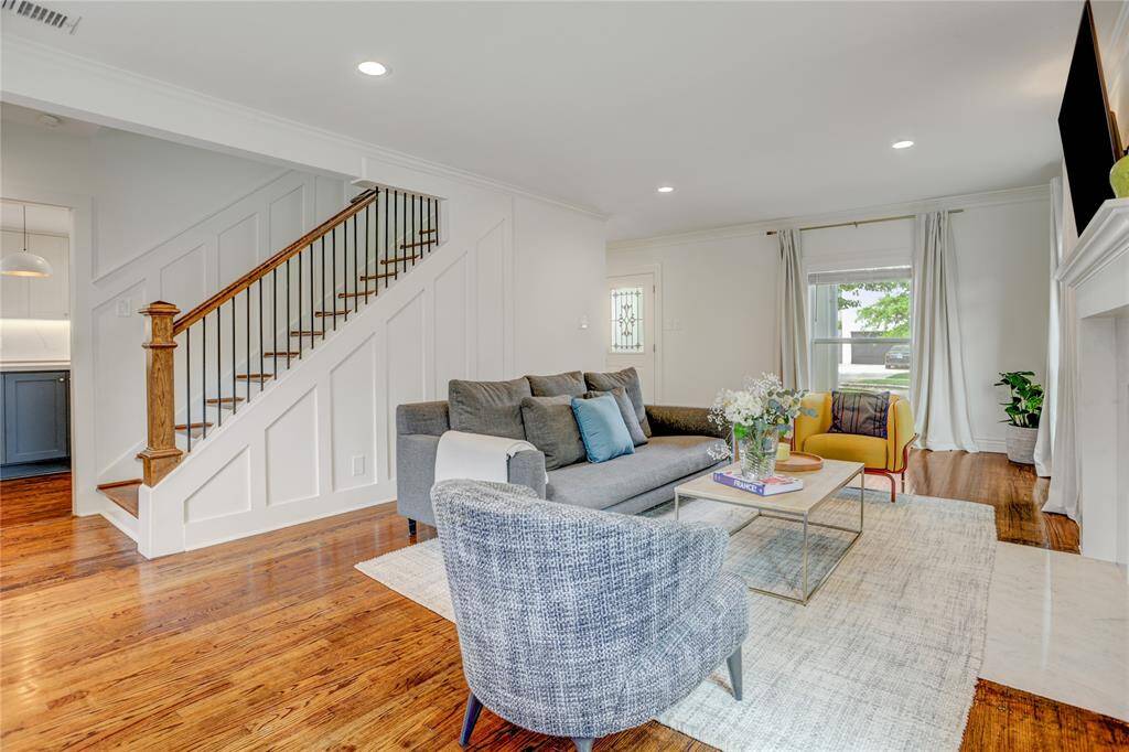 Peek at the wood and iron staircase in the living room.