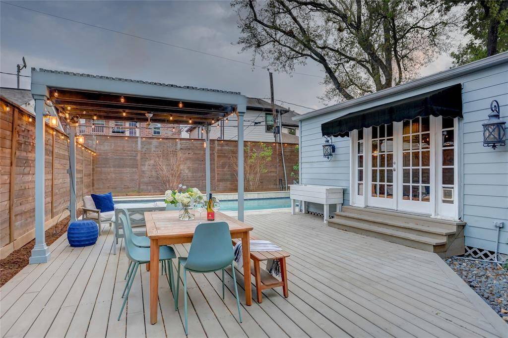 Newly redone sun deck - perfect for outdoor dining and relaxing under the pergola, all overlooking the private pool.