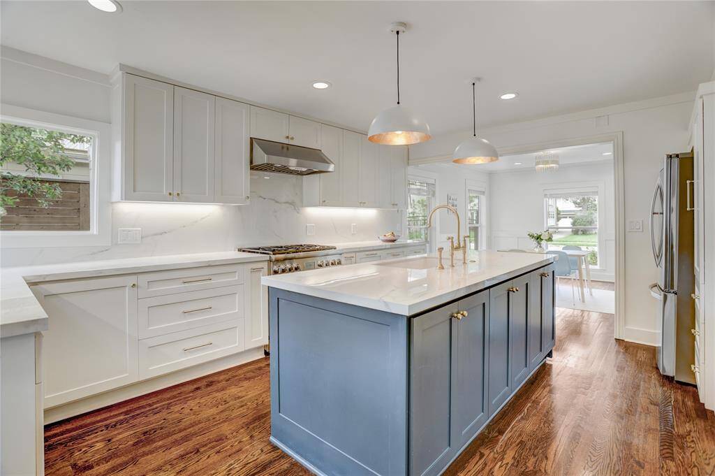 Another look at the sunlit kitchen with corner windows.