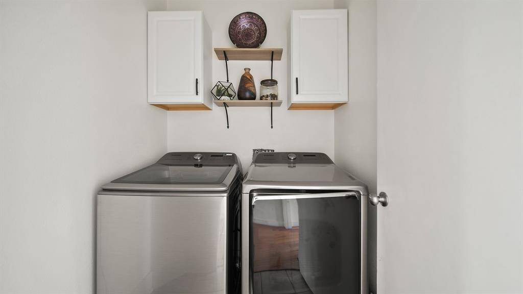 Conveniently located laundry room within the home, offering easy access and functionality.