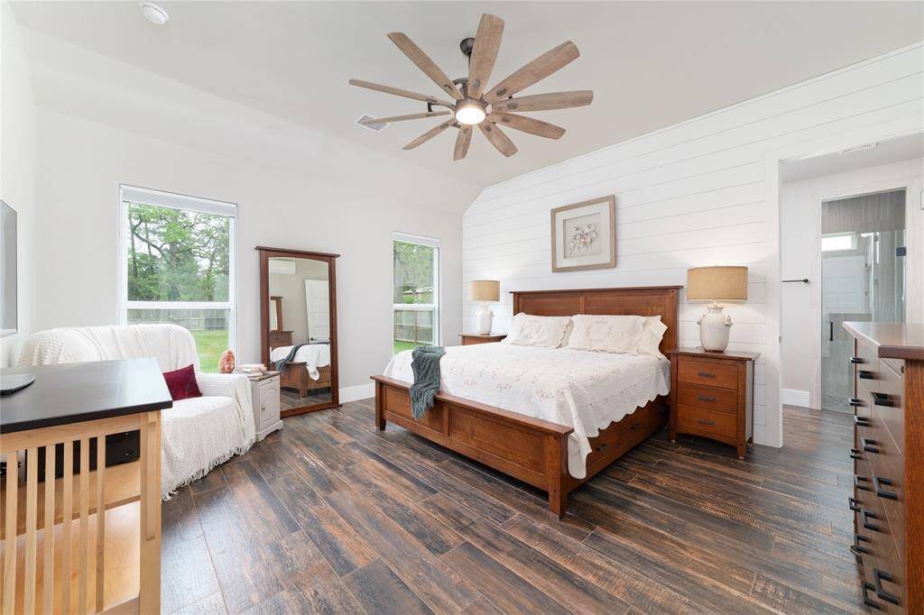 Spacious primary bedroom comfortably accommodates furniture of all sizes, offering flexibility and ease in arranging your perfect retreat.