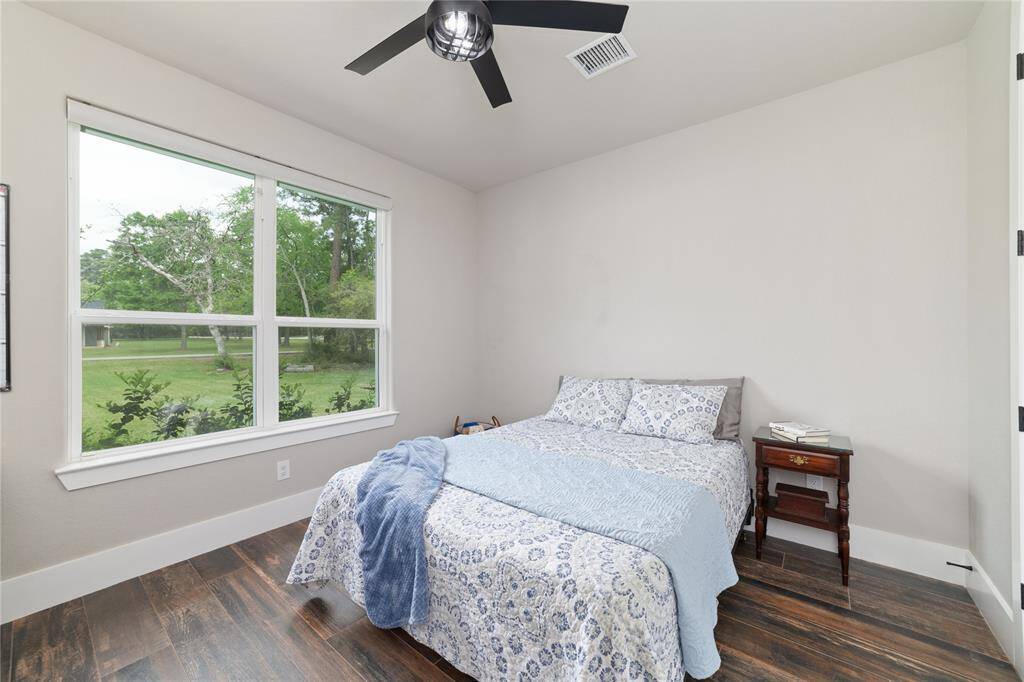 A comfortable guest bedroom is available for those traveling from out of town—ideal for visiting family or friends coming from a distance.