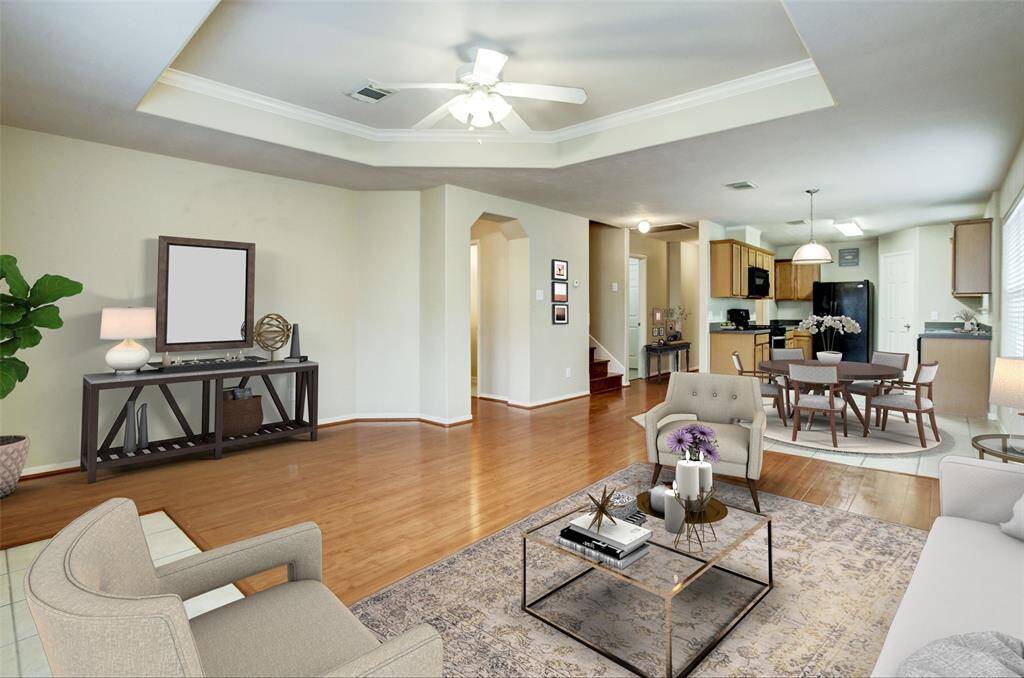 Beautifully appointed living room receives plenty of natural light.