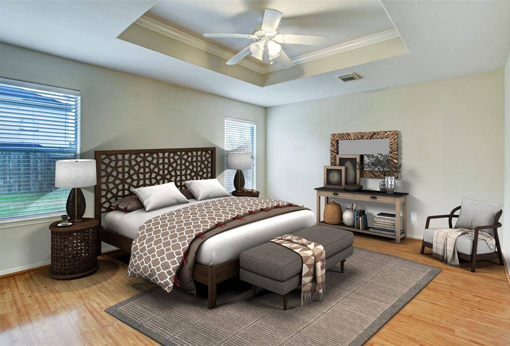 Spacious Master suite with walk-in closet. This room receives plenty of natural light.