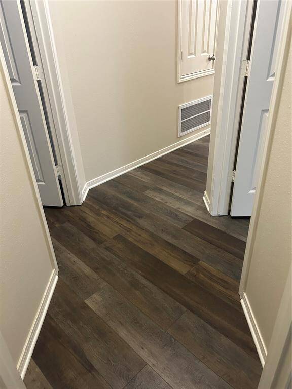 New Vinyl plank Flor on the hallway to the rooms on the second floor.