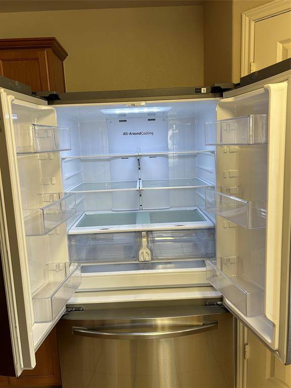 Samsung French. Two doors above and bottom Freezer.
